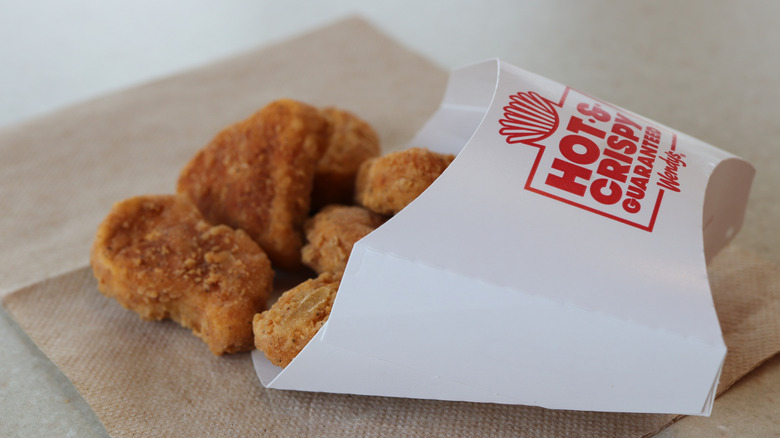 Wendy's nuggets spill from their container.