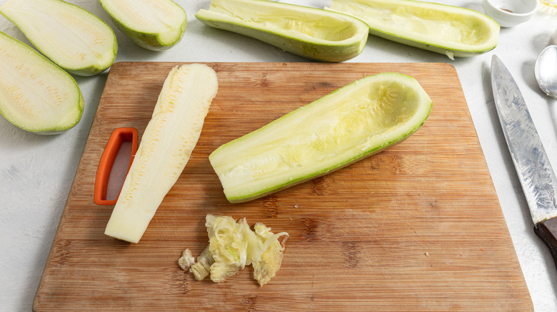 hollowed-out raw zucchinis