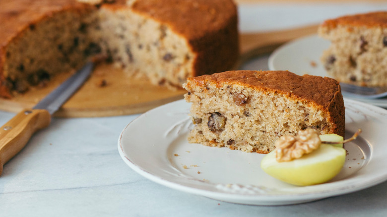 cake served with apples and nuts