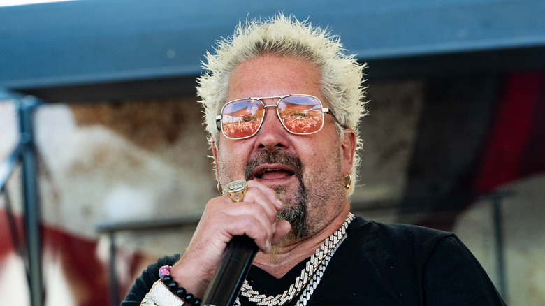 Guy Fieri speaking at an event