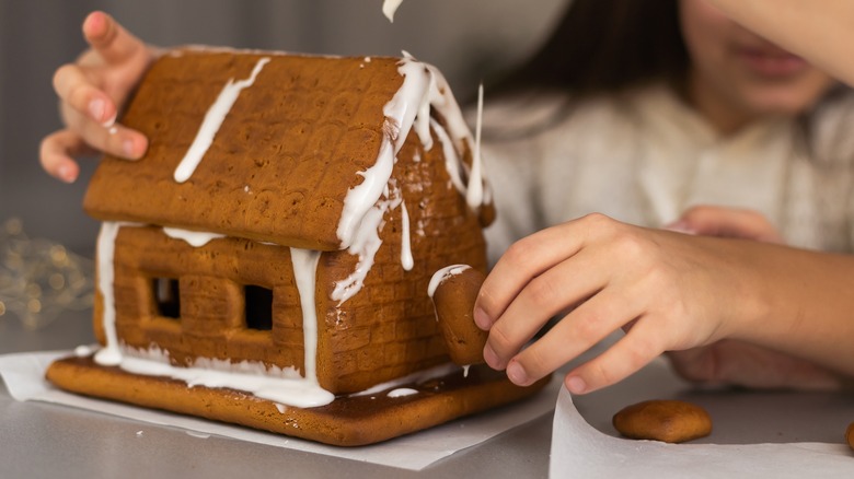 Partially decorated gingerbread house
