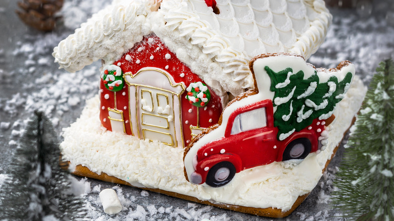 Snow covered gingerbread house