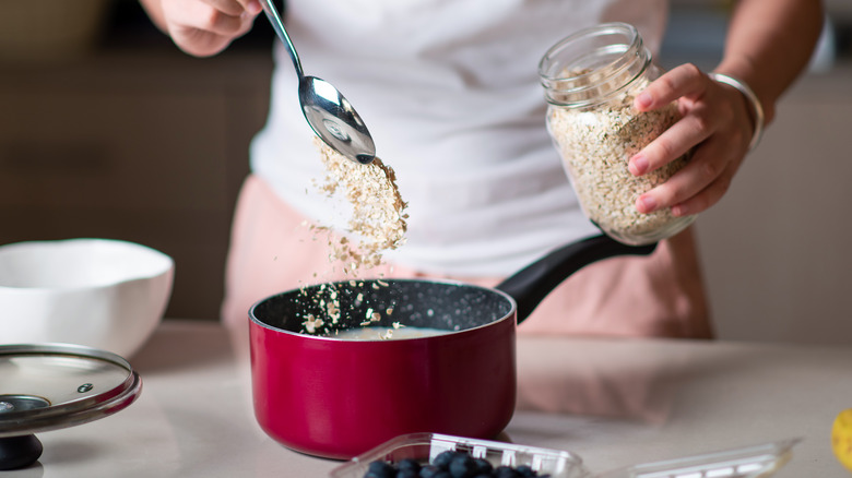 person preparing oatmeal