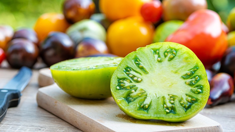 Green tomato cut in half