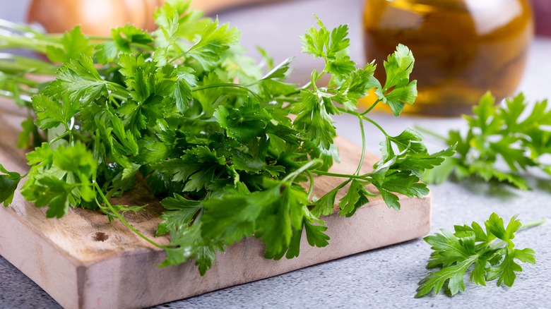 Fresh parsley on chopping board