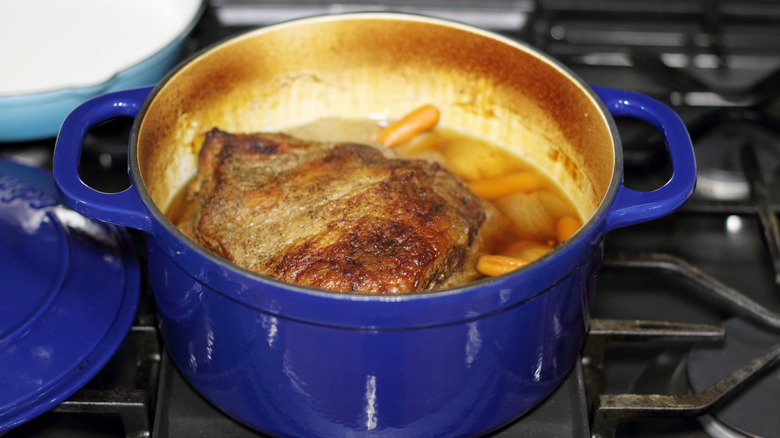 Pot roast in a Dutch oven with the lid off
