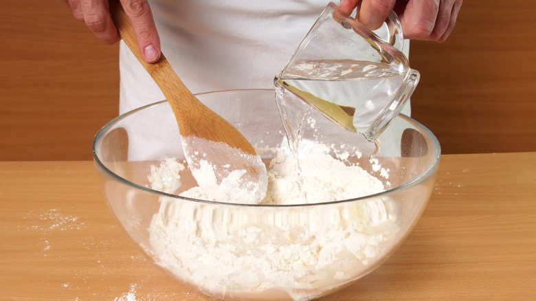 adding water to flour