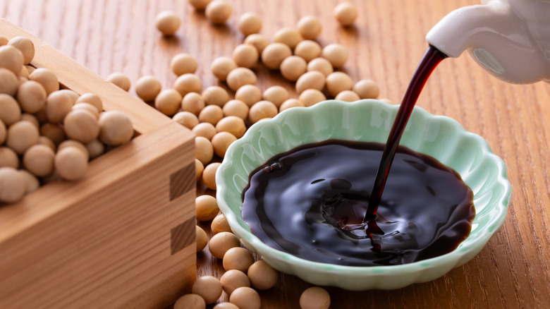 soy sauce pored into serving dish