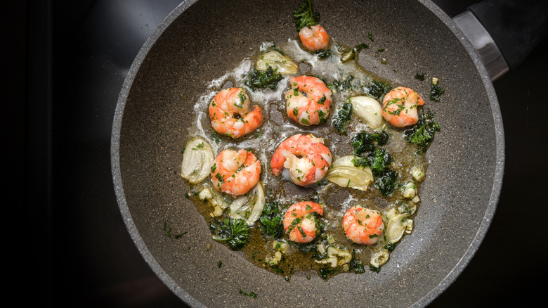 cooking shrimp in a skillet