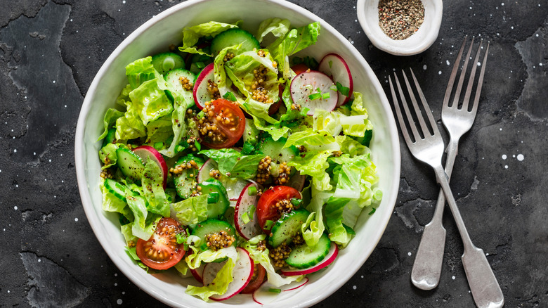 oil dressing topped salad