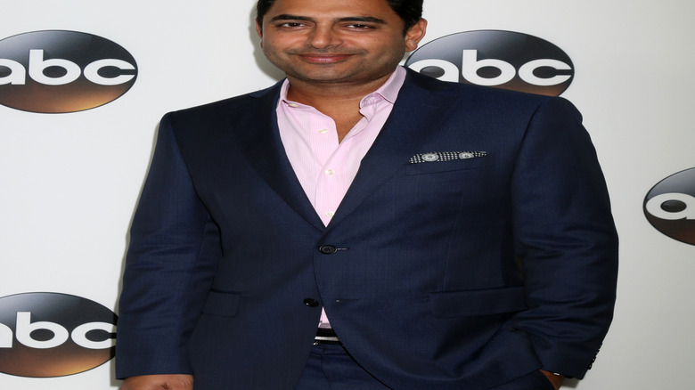 Rohan Oza smiling at camera