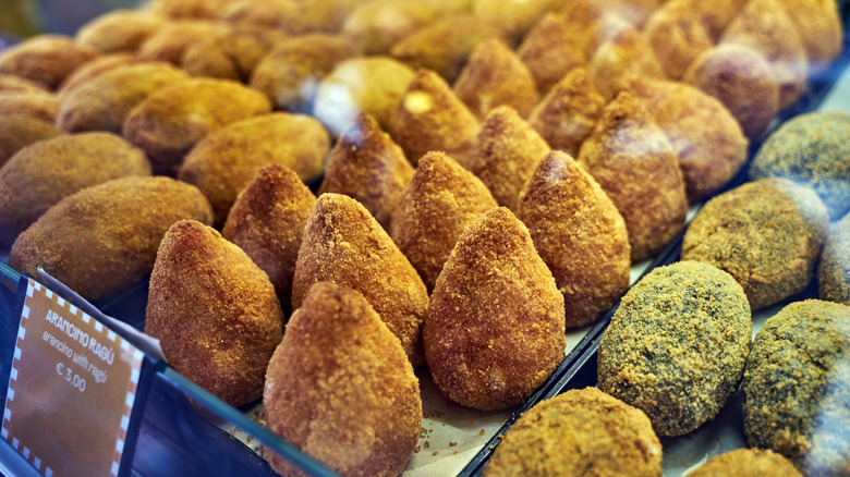 A display case of arancini