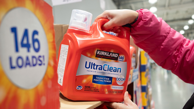 Laundry jug with dispenser