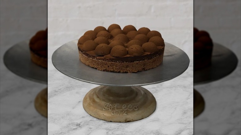 Knipschildt's chocolate truffle cake on a stand