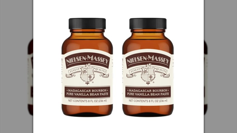 Two bottles of Nielsen-Massey vanilla bean paste.