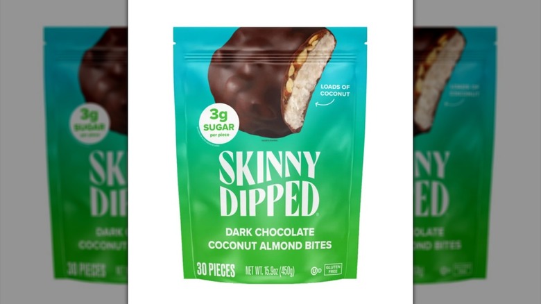 A bag of Skinny Dipped's dark chocolate coconut almond bites.