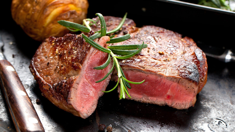 A sliced, medium-rare steak.