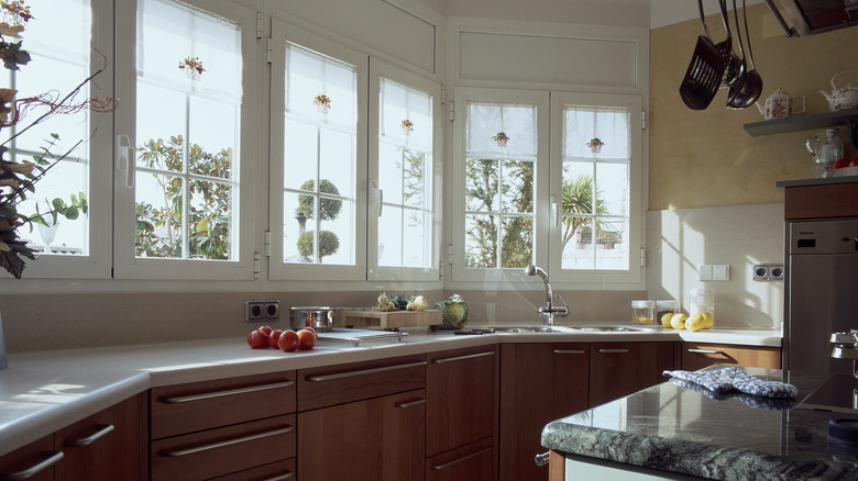 pictured kitchen with wooden cabinets