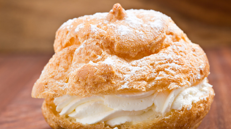 Cream puff of wooden surface