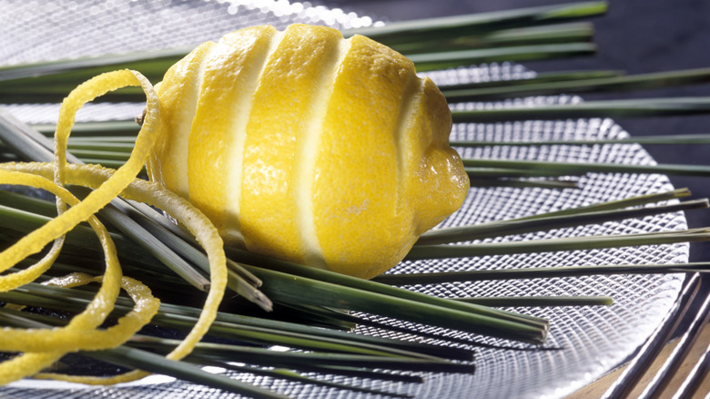 Lemon with strip of peel cut off