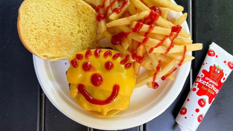 A cheeseburger with a Sketchup smiley face