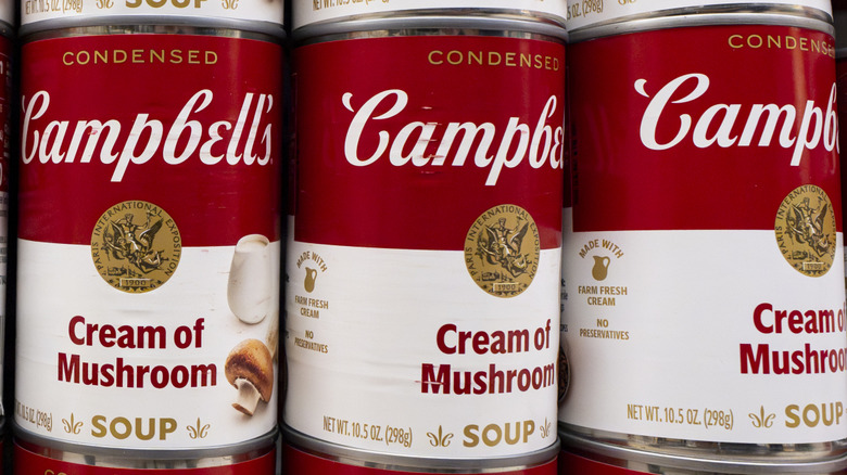 Stacked cans of cream of mushroom soup