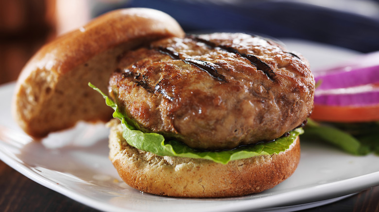 A hamburger with a thick patty.