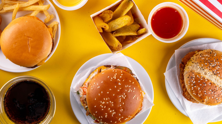 Various fast food burgers and fries.