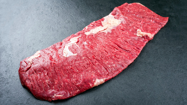 A raw piece of flap steak.