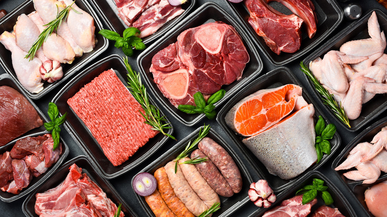 Various fresh, raw meat cuts.