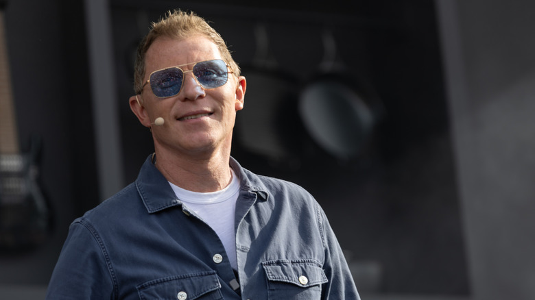 Bobby Flay presenting at an event.