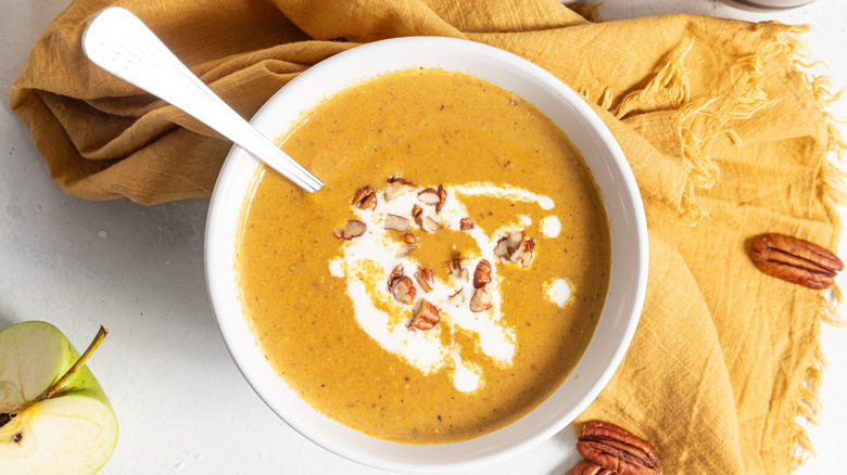 carrot apple pecan soup bowl