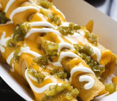 "Cheesy" style: nacho cheese, sour cream and jalapeño relish.