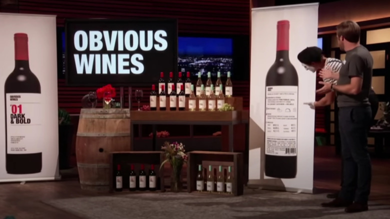 Baillie standing beside Mime on Shark Tank