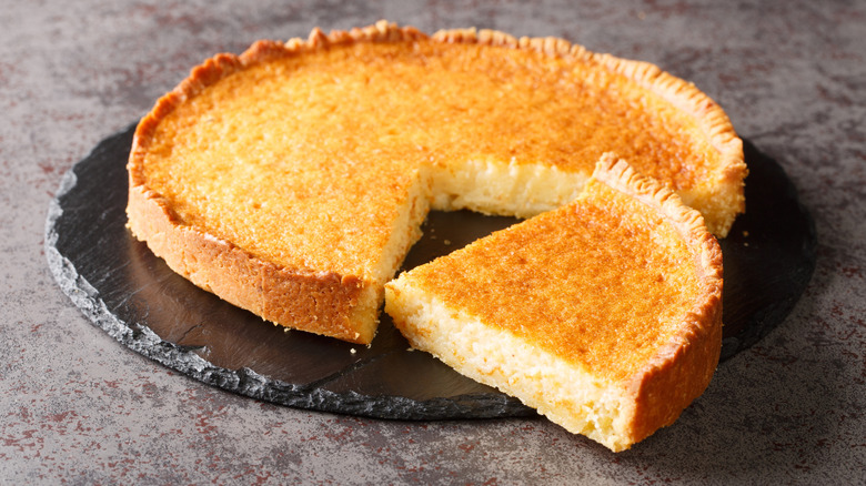 buttermilk pie with a slice cut out