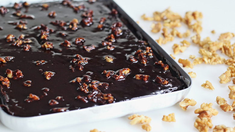 Texas sheet cake in a white tray