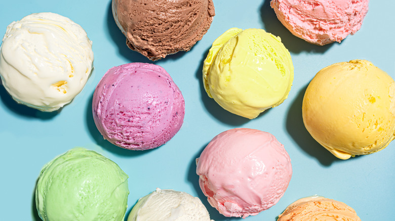 A variety of different ice creams on a blue background