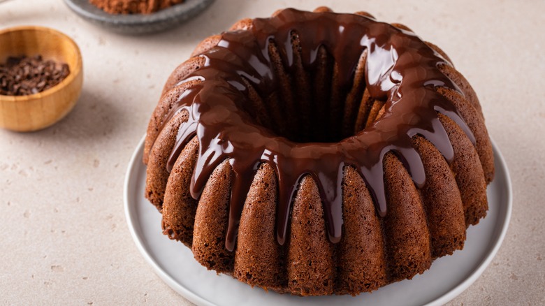 Chocolate bundt cake topped with chocolate sauce
