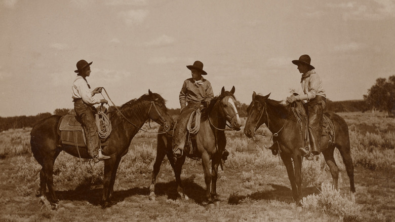 Vintage photo of cowboys.