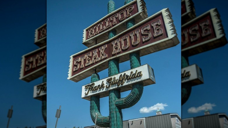 A Hilltop Steak House sign