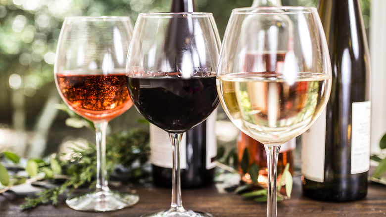 red, white, and rose wine in glasses