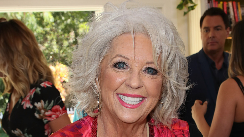 Paula Deen smiling at an event