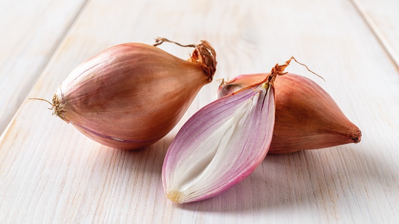 a few shallots on wood