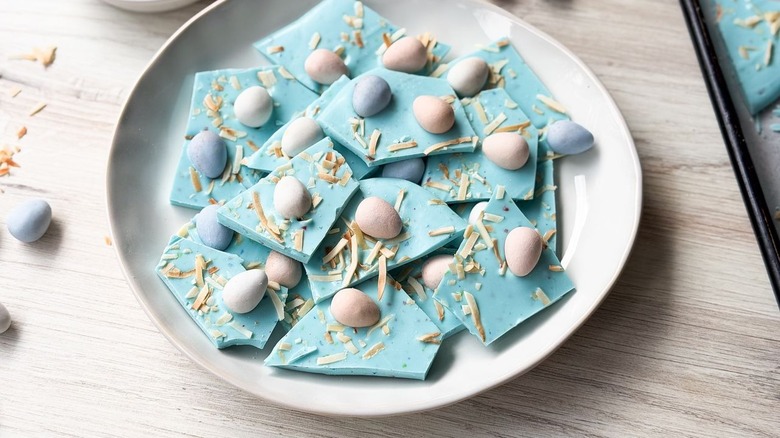 Pastel blue 3-ingredient Easter bark with chocolate eggs and toasted coconut