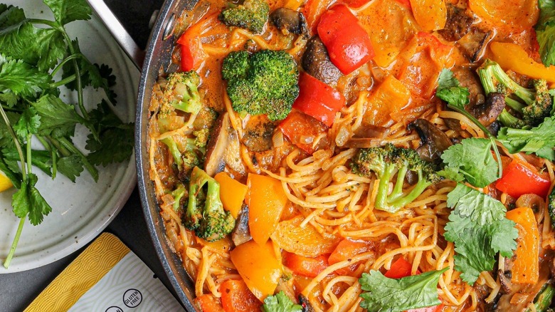 Skillet of Palmini angel hair pasta and veg