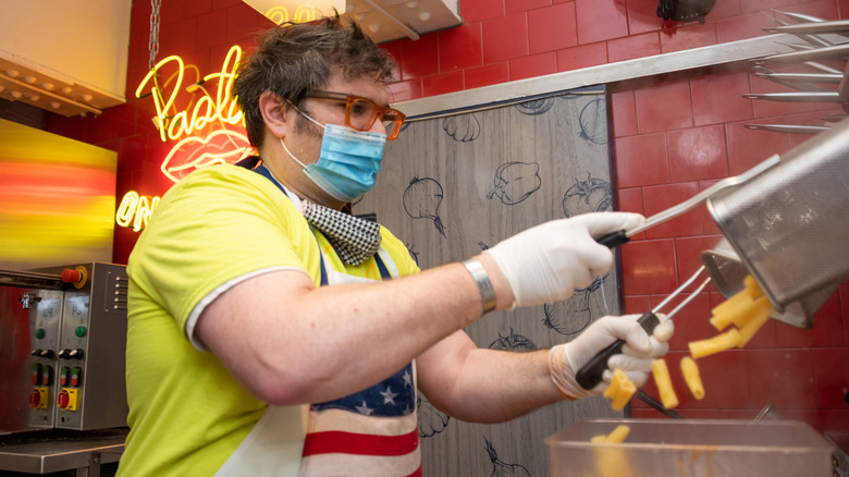 Brandon Fay cooking food