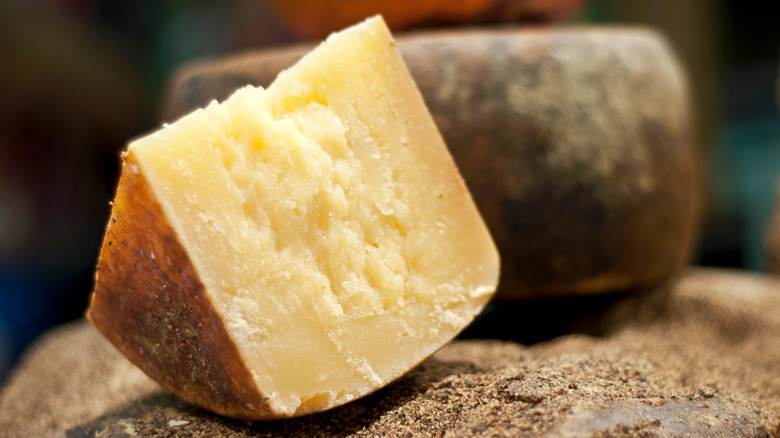 Wedge of crumbly Pecorino Romano cheese
