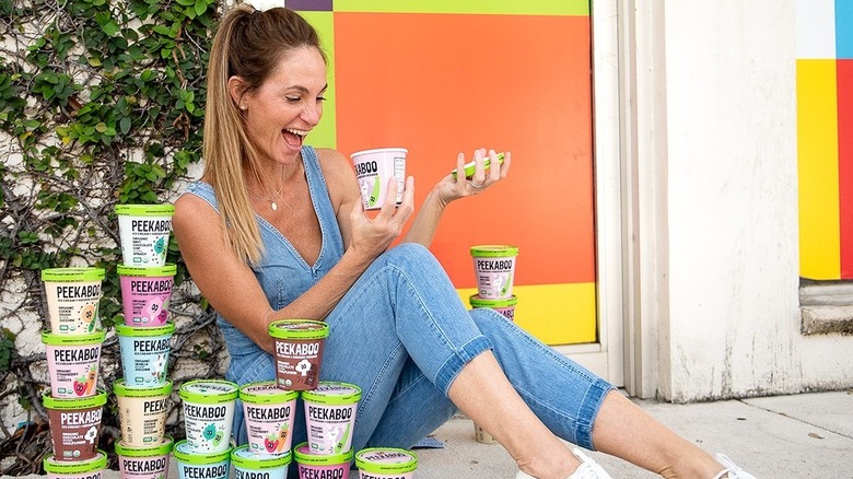 Levinson sitting outside with stacks of Peekaboo ice cream