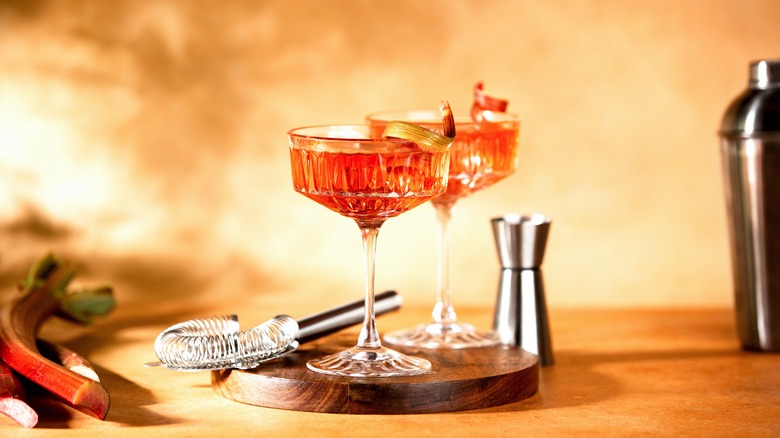 Cocktails with candied rhubarb twists