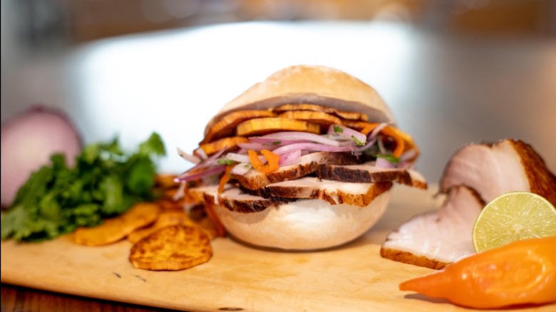 A Peruvian pork belly and sweet potato breakfast sandwich.